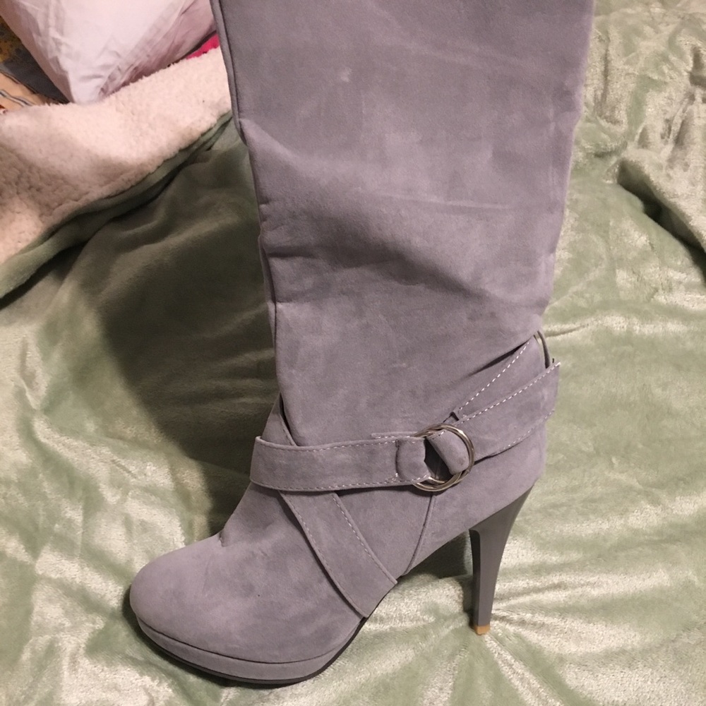 Grey 4” knee high boots. Size 7